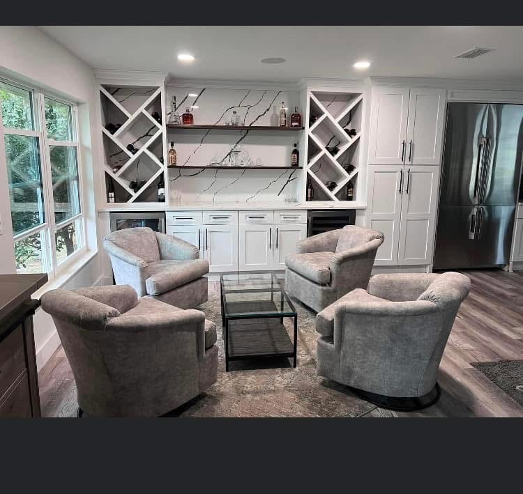 Bar built-in cabinetry and seating area